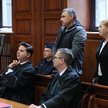 Wołodymyr Żurawlow (C) na sali Sądu Okręgowego w Warszawie