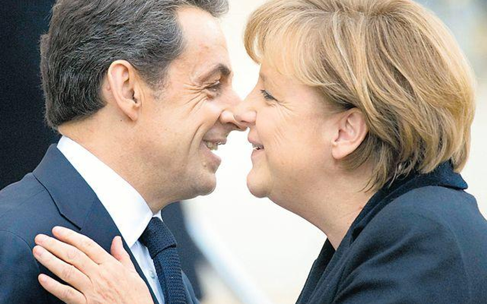 Nicolas Sarkozy i Angela Merkel tuż przed wczorajszym spotkaniem