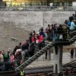 Tłum imigrantów z Bliskiego Wschodu na dworcu w Malmö
