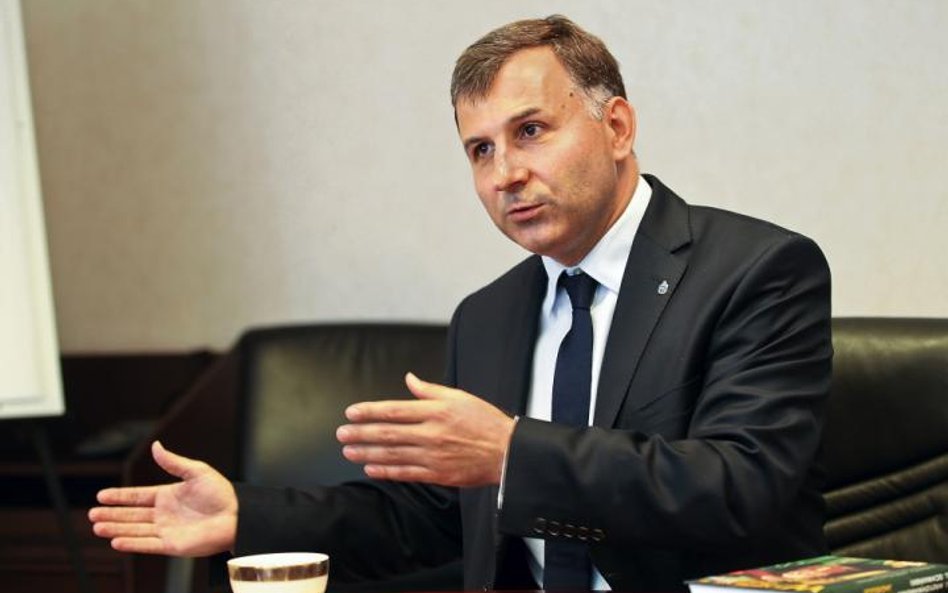 Zbigniew Jagiełło, prezes PKO?BP, chciałby mieć w swojej grupie Bank Pocztowy.