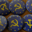 Plakietki dostępne podczas warszawskiego spotkania z Ganleyem, luty 2009
