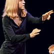 Dyryguje Maria Schneider