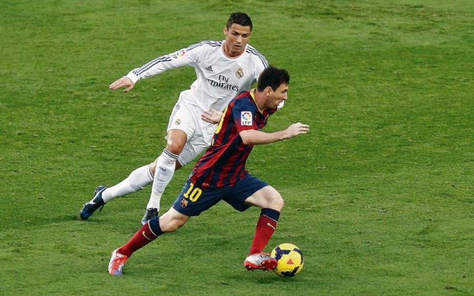 Cristiano Ronaldo i Leo Messi napędzają dziś nie tylko Real i Barcelonę, ale cały futbolowy świat /