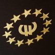 Symbol euro wpisany w unijne gwiazdki