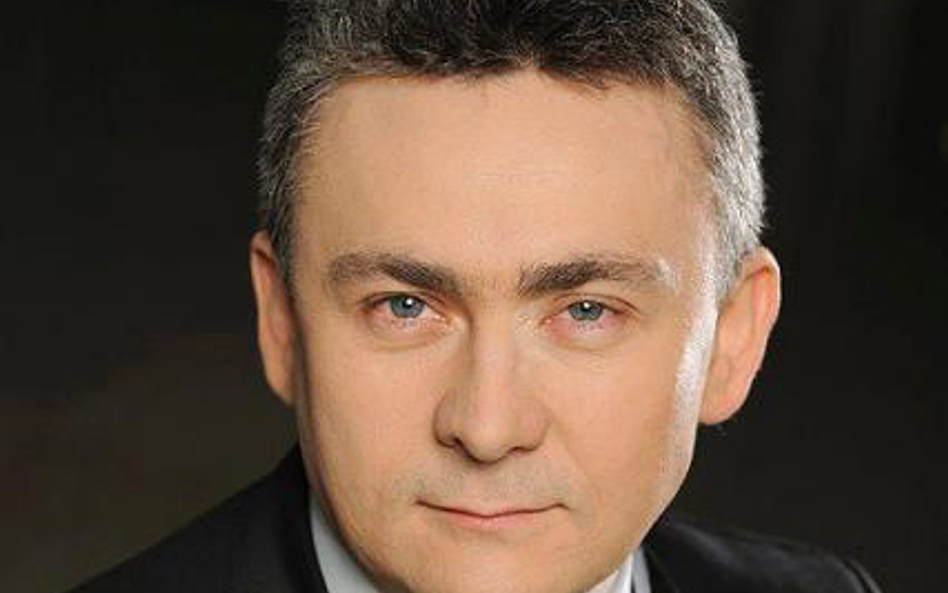 Jarosław Koziński, partner EY