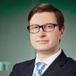 Łukasz Olszewski, dyrektor w S&P