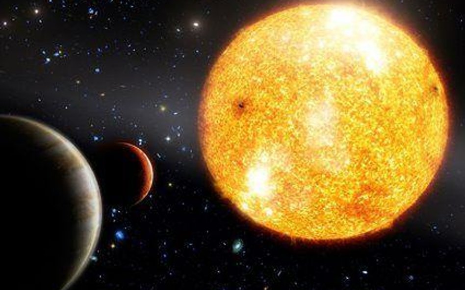 Artystyczna wizja starej gwiazdy oraz bliskich jej planet podobnych do naszego Jowisza (Fot. Timothe