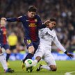 Lionel Messi i Raphael Varane w meczu półfinałowym piłkarskiego Pucharu Króla