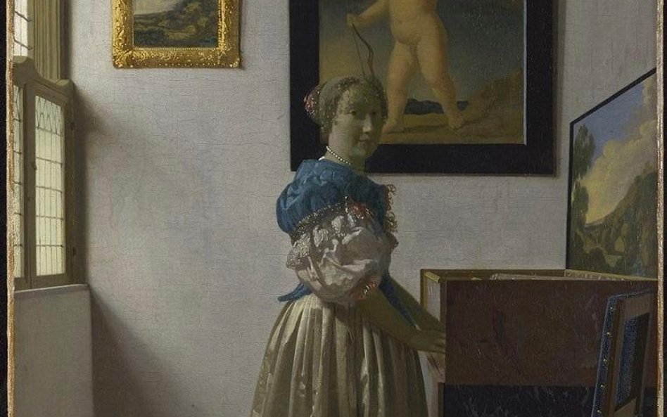 A Young Woman standing at a Virginal; Johannes Vermeer