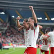 Piłkarze reprezentacji Polski, Matty Cash i Kamil Grosicki, cieszą się z gola podczas meczu towarzys