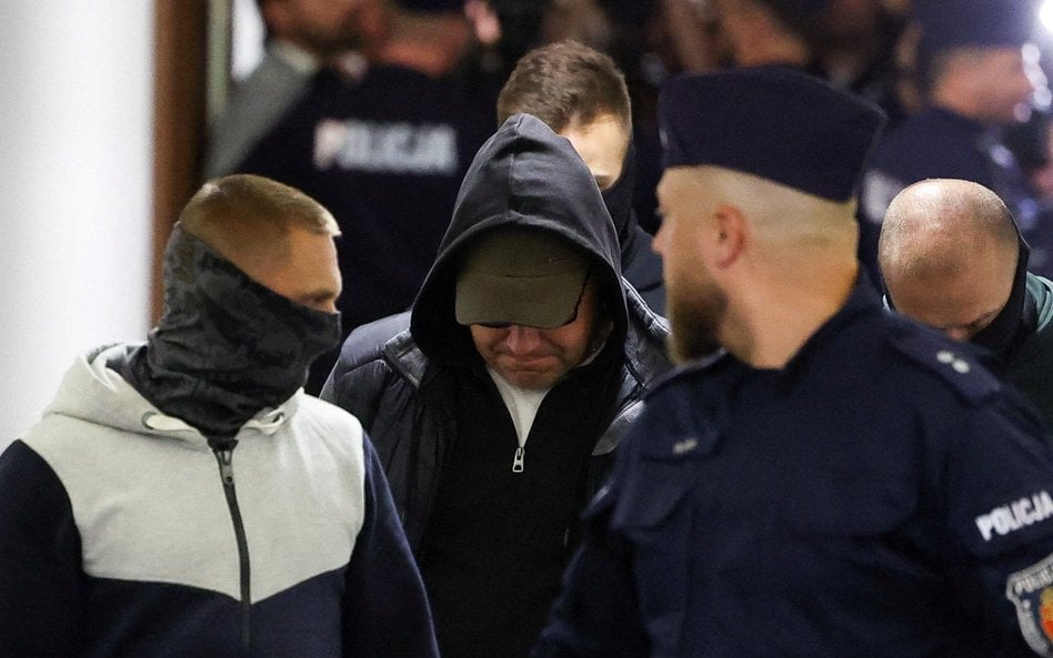 Wołodymyr Ż. eskortowany przez polską policję