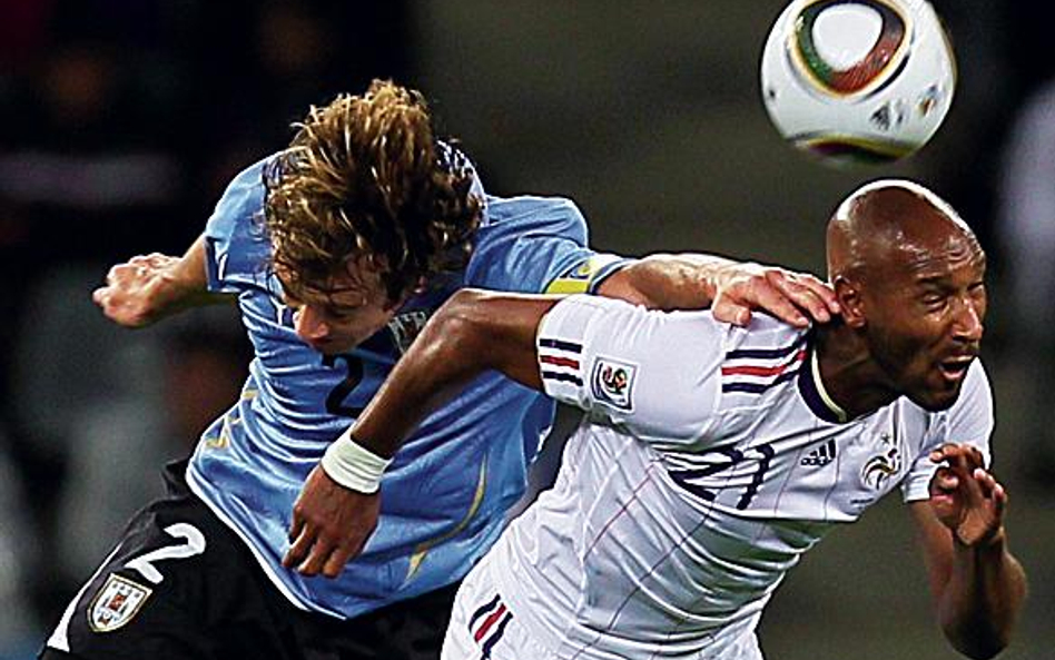 Nicolas Anelka (z prawej) i Urugwajczyk Diego Lugano