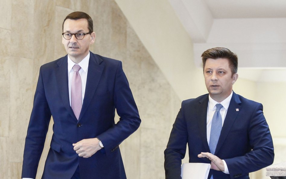 Były premier Mateusz Morawiecki i były szef KPRM Michał Dworczyk