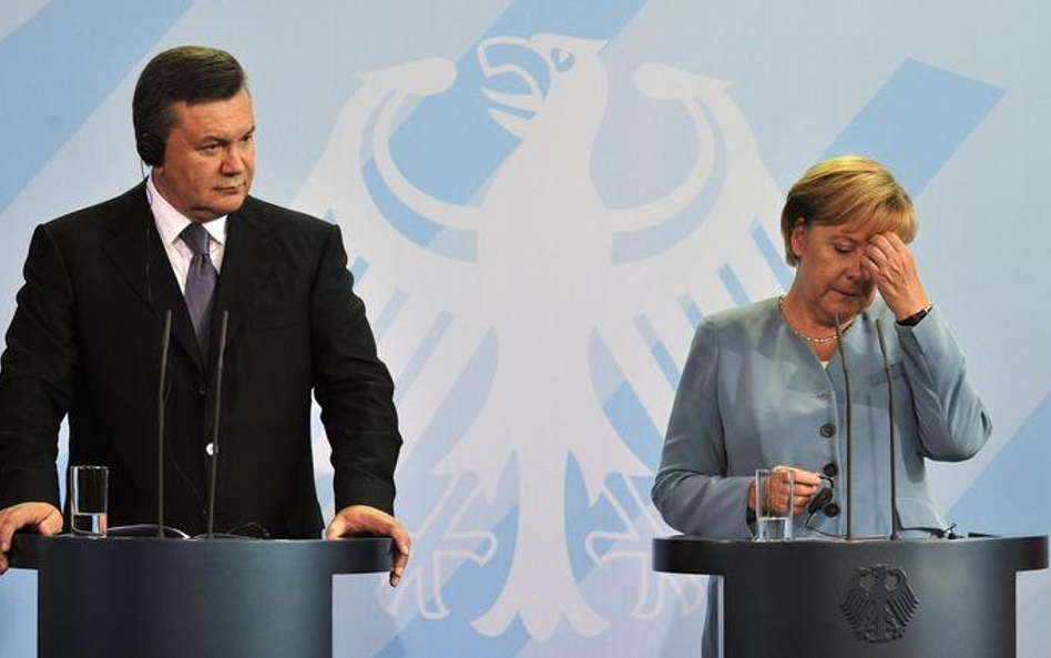 Wiktor Janukowycz i Angela Merkel