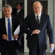 Szef banku centralnego?Marek Belka (z lewej) i minister finansów Jacek Rostowski po czwartkowym spot