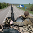 Ukrainian armored personnel carrier on the road near Slavyansk