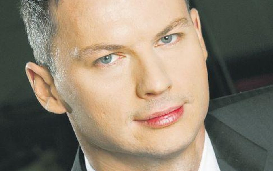 Sebastian Łyczba , partner Ernst & Young, szef Działu Rynków Publicznych