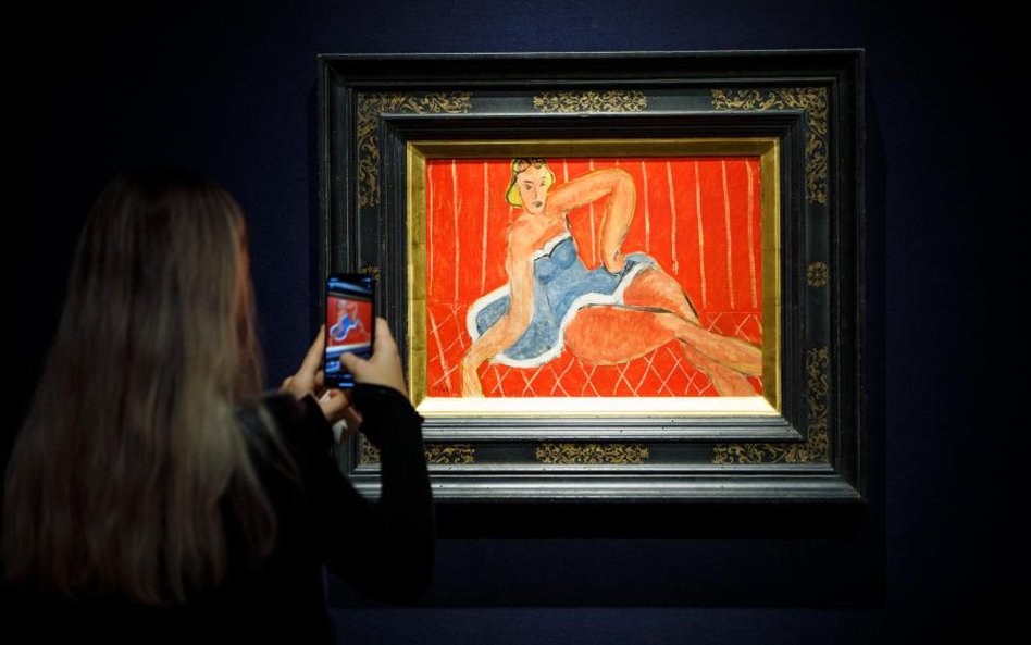 'Danseuse assise sur une table, fond rouge' Henri Matisse