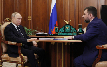 Władimir Putin i Denis Puszylin