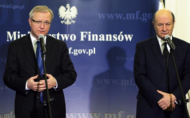 Unijny komisarz Olli Rehn (z lewej) rozmawiał z polskim ministrem finansów Jackiem Rostowskim także 