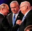 Prezydent Rosji Władimir Putin wita się z premierem i prezydentem Izraela Beniaminem Netanjahu i Reu