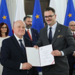 Przewodniczący PKW Sylwester Marciniak i poseł PiS Łukasz Mejza