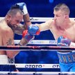 Tomasz Adamek (z prawej) po walce z Solomonem Haumono: – Do zobaczenia wkrótce