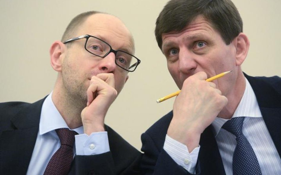 Ukraiński premier Arsenij Jaceniuk i wicepremier Oleksandr Sycz mają przed sobą ekstremalnie trudne 