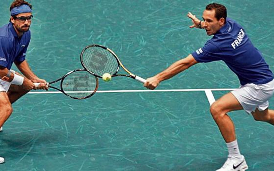 Arnaud Clement (z lewej) i Michael Llodra już w sobotę postawili pieczęć na sukcesie w Lyonie