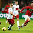 Jakub Błaszczykowski między portugalskimi gwiazdorami Cristiano Ronaldo i Nanim (z lewej)