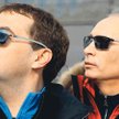 Russian President Dmitry Medvedev (L) and Prime Minister Vladimir Putin visit the newly built Rosa K