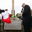 Europoseł Grzegorz Braun (C) podczas odsłonięcia alei pamięci z 8 głazami i tablicami, których treść
