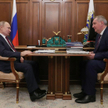Prezydent Rosji Władimir Putin w rozmowie z Dmitrijem Rogozinem, szefem Roskosmosu
