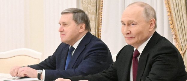 Władimir Putin i jego doradca Jurij Uszakow podczas rozmów z delegacją amerykańską