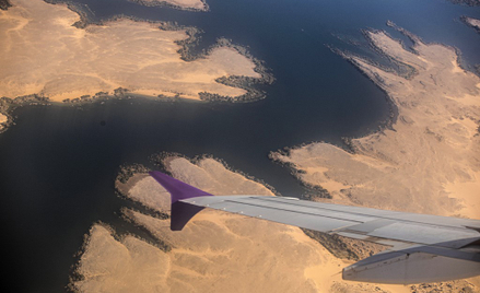 Egipt (na zdjęciu Nil na wysokości Asuanu z lotu ptaka) to jeden z kierunków najchętniej odwiedzanyc