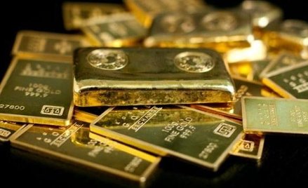 Nie tylko akcje pławią się dziś w blasku. Lśni też złoto