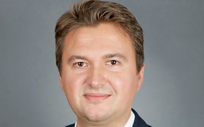 Kamil Cisowski analityk, DI Xelion.