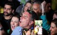 Kandydat na prezydenta Brazylii Flavio Bolsonaro z Partii Liberalnej oraz jego współpracownicy po og
