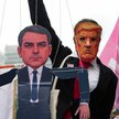 Wiec Luiza Inácio Luli da Silvy, São Paulo, 24 października. Człowiek w masce przedstawiającej prezy