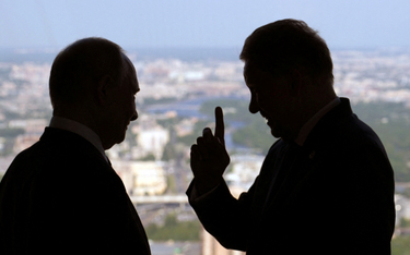 Prezydent Władimir Putin i prezes Gazpromu Aleksiej Miller