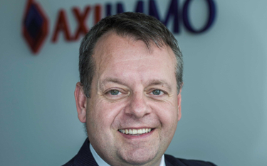 Rafał Osiecki, prezes AXI IMMO.