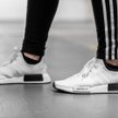 Trzy paski pojawiły się na produktach Adidasa w 1949 roku.