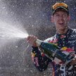 Sebastian Vettel cieszy się z pierwszego zwycięstwa przed własną publicznością