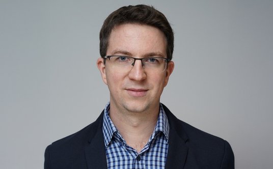 dr Grzegorz Wesołowski, ekonomista specjalizujący się w ekonomii międzynarodowej i monetarnej, praco