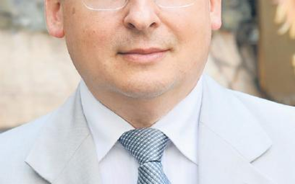 Adam Tochmański, dyr. Departamentu Systemu Płatniczego NBP.