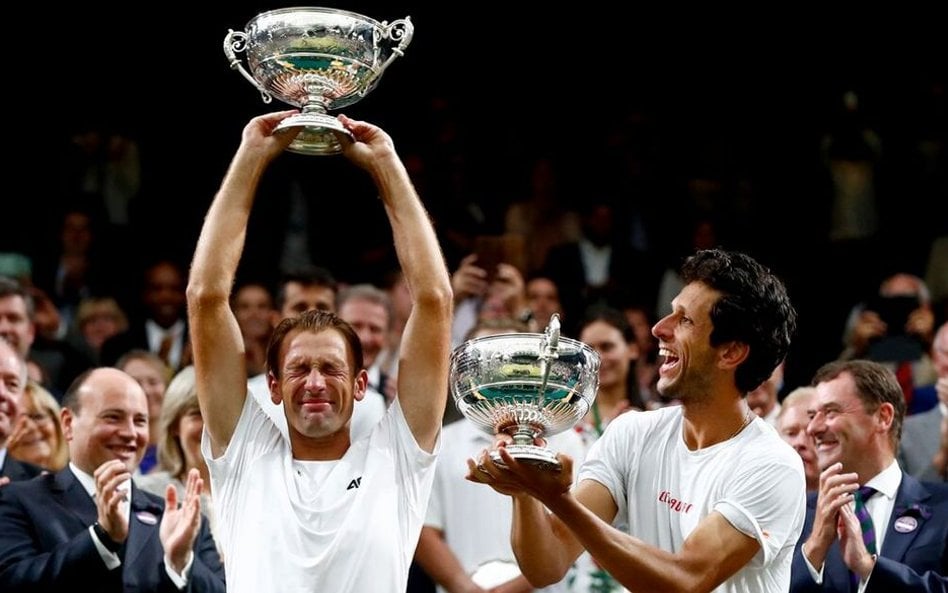 Łukasz Kubot (z lewej) i jego deblowy partner Marcelo Melo.