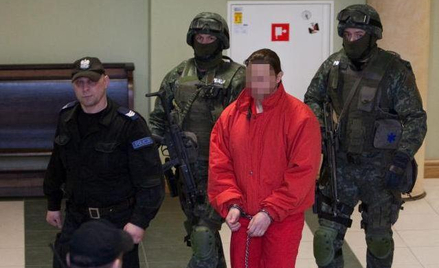 Ryszard Bogucki w 2010 r. w sądzie jako oskarżony w sprawie o zabójstwo gen. Marka Papały. Czerwony 