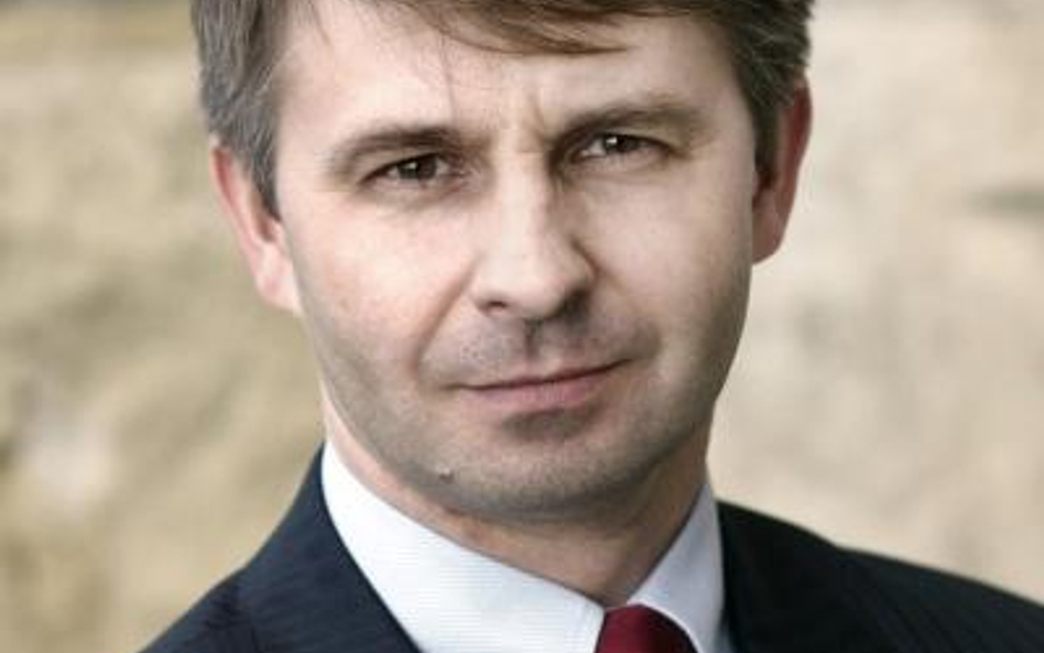 Mariusz Andrzejewski, biegły rewident