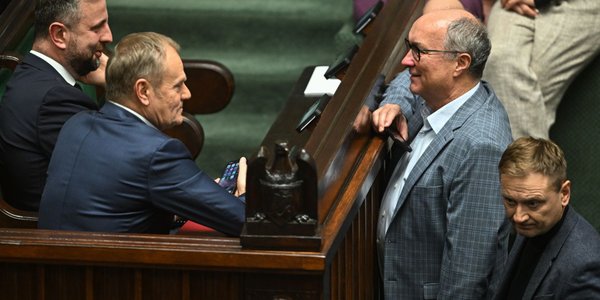 Poles nearly split on whether ruling coalition should run on joint list