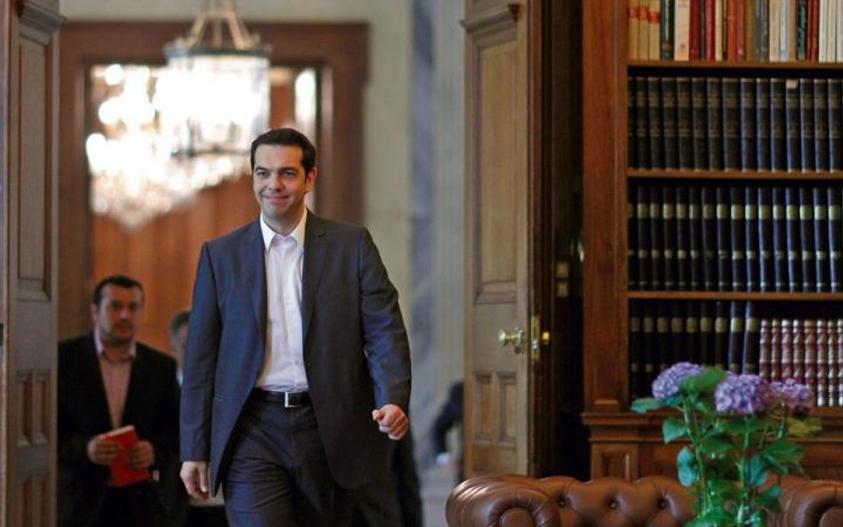 Alexis Tsipras, szef partii Syriza, szykuje się na zwycięstwo wyborcze i chce renegocjować umowy z M